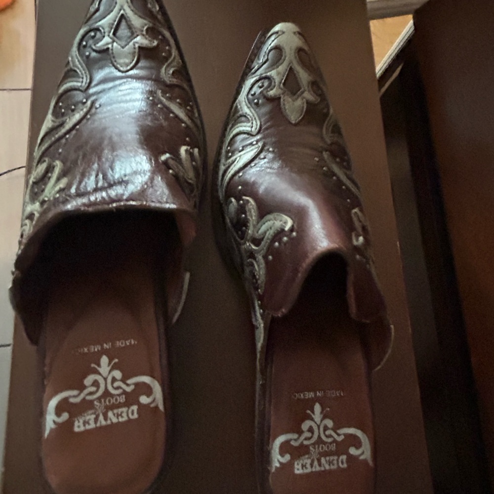 Brown and Turqoise Leather Embroidered Mules
Size 7.5. Barely Worn.